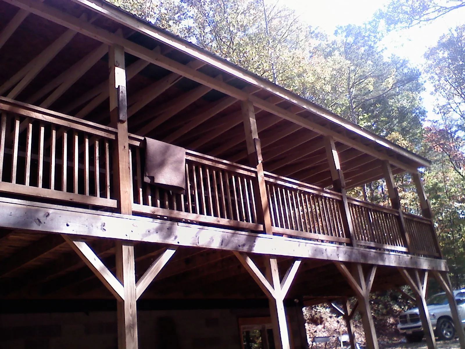 Timber framing under a new elevated porch and deck — Roof Leak Repair in Guthrie Center by Roofing Brothers